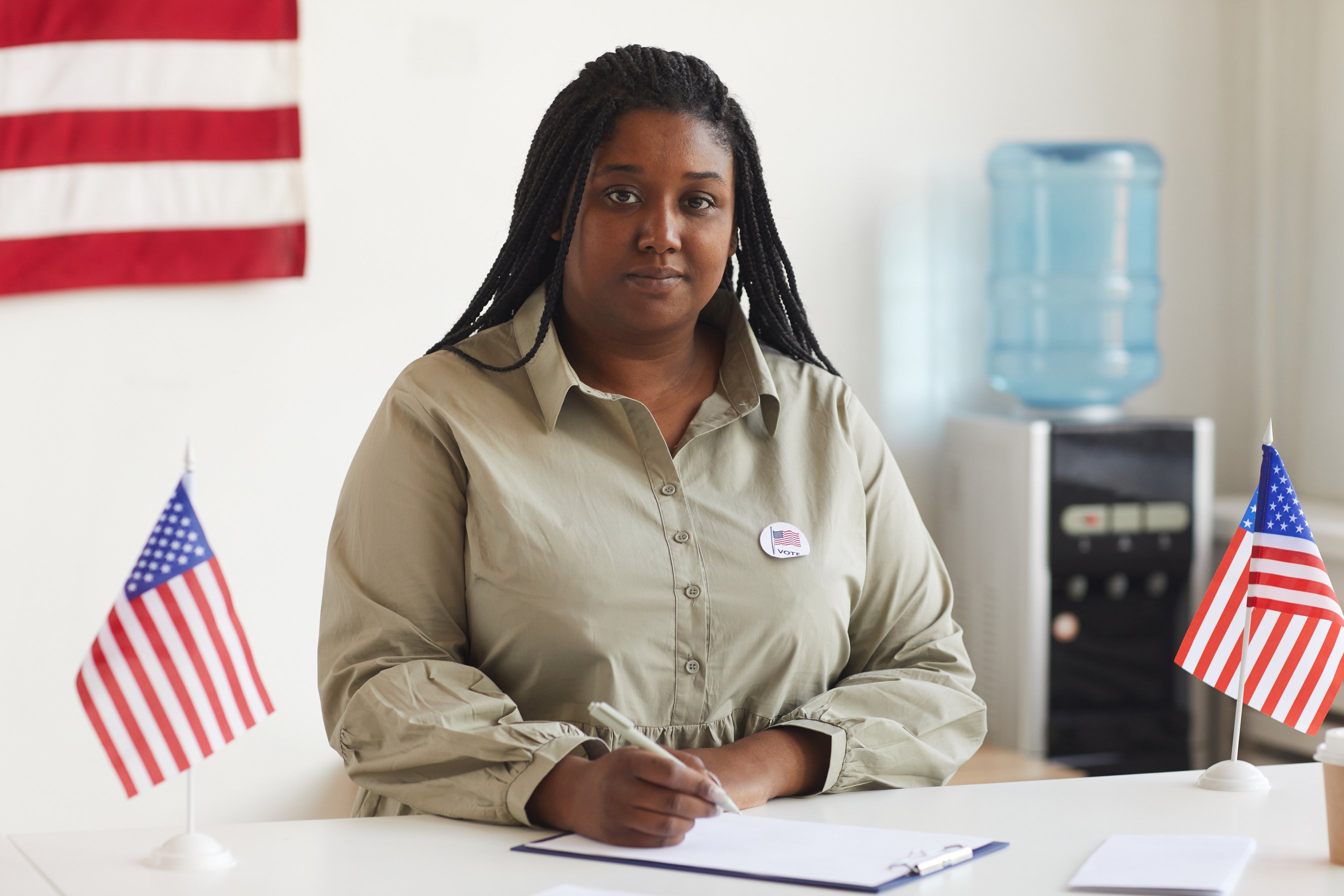 African-American Woman at Voting Station